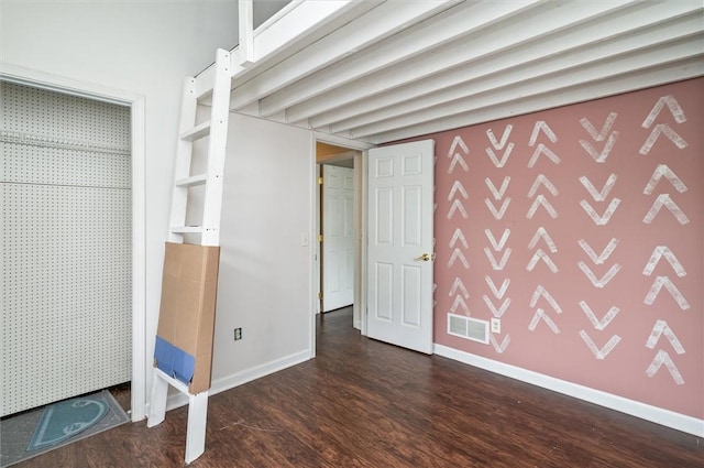 39 Castleford Rd, Greece, NY 14616 - unfurnished bedroom featuring dark wood-style flooring and baseboards