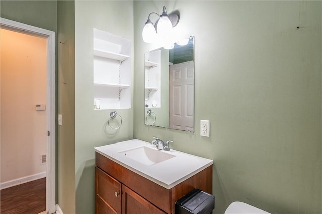 39 Castleford Rd, Greece, NY 14616 - half bath featuring vanity and wood finished floors