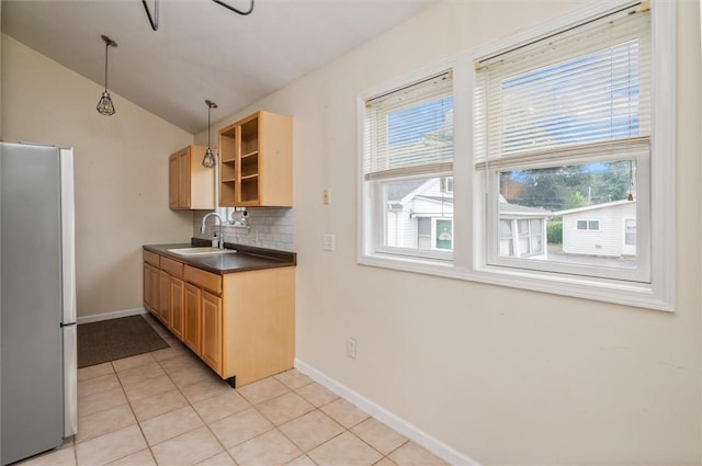 39 Castleford Rd, Greece, NY 14616 - kitchen featuring freestanding refrigerator, dark countertops, healthy amount of natural light, lofted ceiling, and open shelves