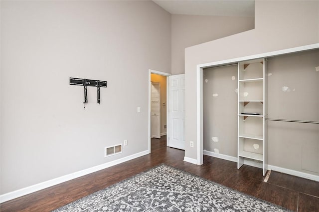 39 Castleford Rd, Greece, NY 14616 - unfurnished bedroom with wood finished floors and high vaulted ceiling