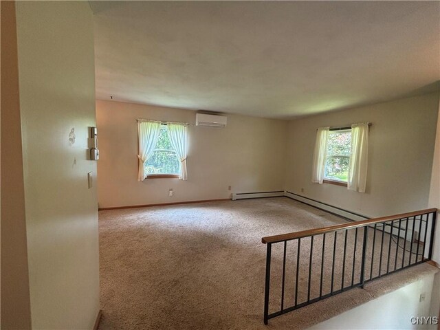 36 Lee Rd, Dryden, NY 13053 - carpeted spare room featuring a wall mounted air conditioner, plenty of natural light, and stairs