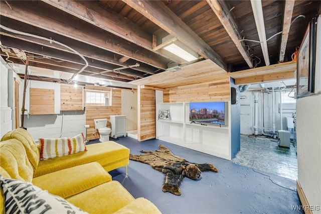 315 Westfield Rd N, Amherst, NY 14226 - living area featuring concrete floors and wooden walls
