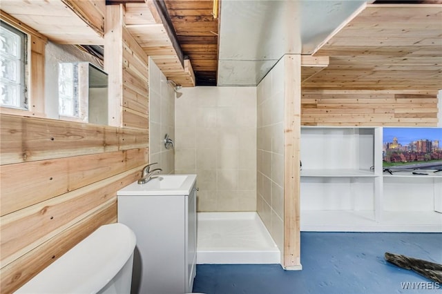 315 Westfield Rd N, Amherst, NY 14226 - full bath featuring a stall shower, finished concrete floors, vanity, and wooden walls