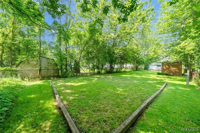 315 Westfield Rd N, Amherst, NY 14226 - fenced backyard featuring a shed