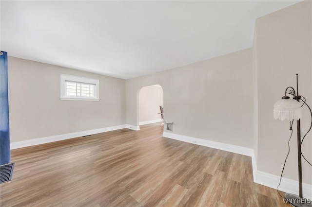 315 Westfield Rd N, Amherst, NY 14226 - empty room with arched walkways and wood finished floors