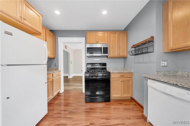 315 Westfield Rd N, Amherst, NY 14226 - kitchen featuring white appliances, light brown cabinetry, light wood-type flooring, and recessed lighting