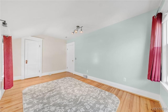 315 Westfield Rd N, Amherst, NY 14226 - bedroom with wood finished floors and lofted ceiling