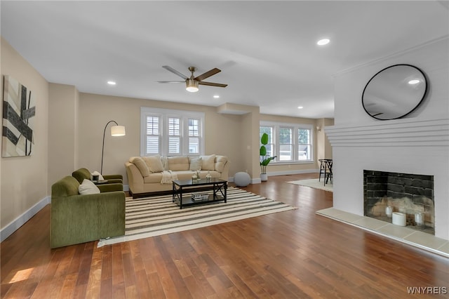 64 Sagamore Ter, Buffalo, NY 14214 - living area featuring ceiling fan, wood finished floors, a fireplace, and recessed lighting