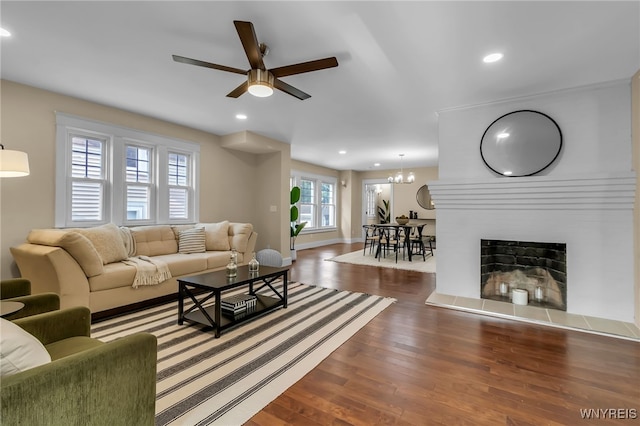 64 Sagamore Ter, Buffalo, NY 14214 - living room with ceiling fan, wood finished floors, recessed lighting, and a chandelier