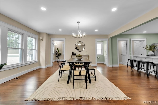 64 Sagamore Ter, Buffalo, NY 14214 - dining area with dark wood-style flooring, a chandelier, and recessed lighting