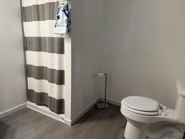 1086 Sweatman Ave, Oneida-Inside, NY 13421 - full bath with wood finished floors and a shower with curtain