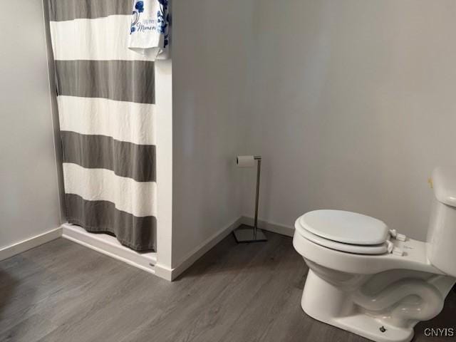 1086 Sweatman Ave, Oneida-Inside, NY 13421 - bathroom featuring wood finished floors and a shower with shower curtain