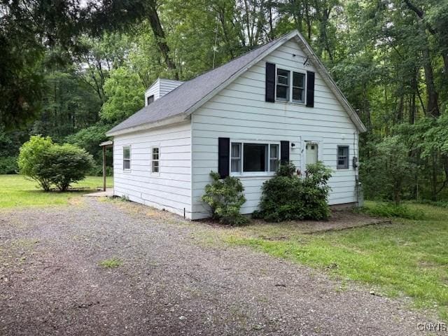 1086 Sweatman Ave, Oneida-Inside, NY 13421 - view of side of home featuring view of wooded area