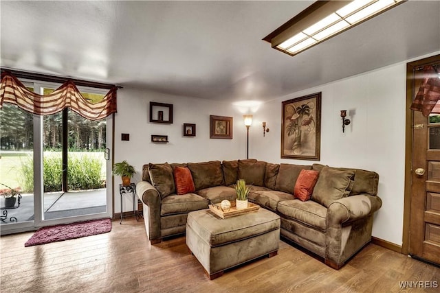 3738 Forks Rd, Yorkshire, NY 14134 - living area featuring wood finished floors and baseboards