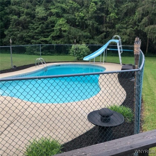 3738 Forks Rd, Yorkshire, NY 14134 - view of pool with a water slide and a view of trees