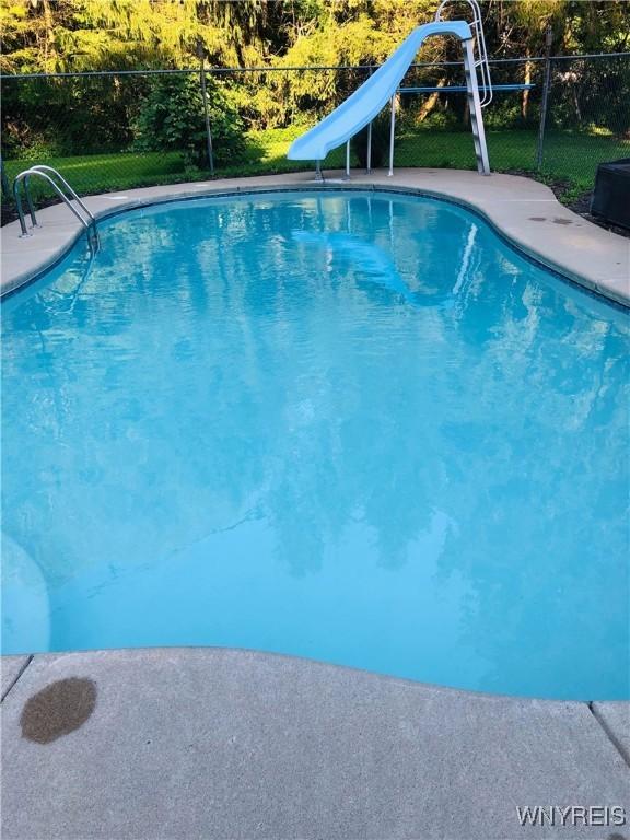3738 Forks Rd, Yorkshire, NY 14134 - view of swimming pool with a water slide