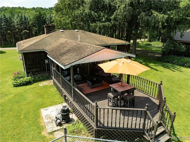 3738 Forks Rd, Yorkshire, NY 14134 - back of property with outdoor dining area, roof with shingles, a wooden deck, a yard, and a forest view