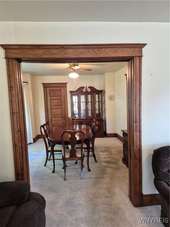 359 Utica St, Tonawanda-City, NY 14150 - dining space featuring light colored carpet and a ceiling fan