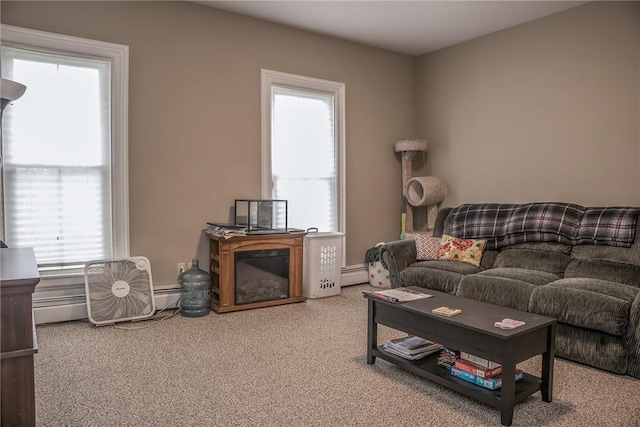 21 Washington St, Greene, NY 13778 - carpeted living area with a baseboard heating unit