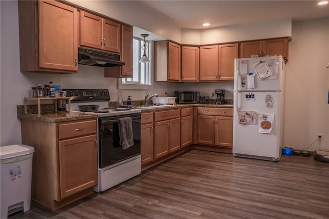 21 Washington St, Greene, NY 13778 - kitchen featuring white appliances, under cabinet range hood, dark countertops, dark wood-style flooring, and recessed lighting