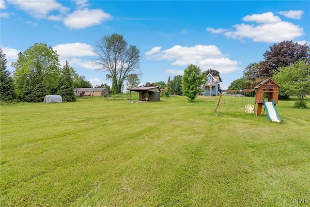 670 County Route 25th Rd Unit 25, Minetto, NY 13126 - view of green lawn featuring a playground
