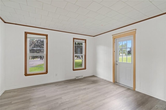 670 County Route 25th Rd Unit 25, Minetto, NY 13126 - unfurnished room with ornamental molding, healthy amount of natural light, and light wood-style floors