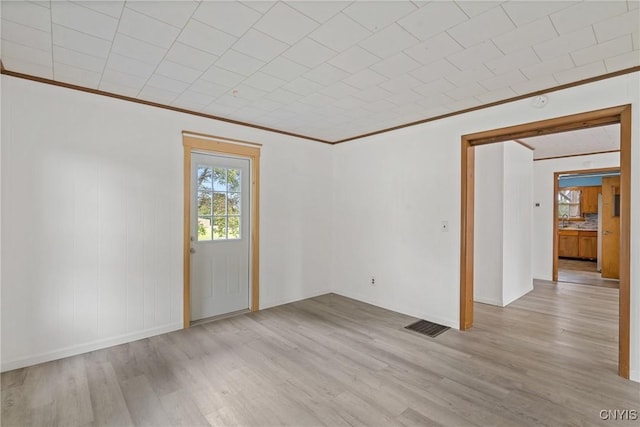 670 County Route 25th Rd Unit 25, Minetto, NY 13126 - spare room with ornamental molding and wood finished floors