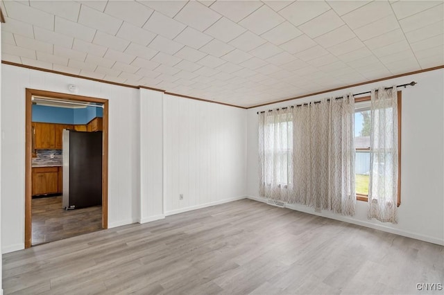 670 County Route 25th Rd Unit 25, Minetto, NY 13126 - empty room with crown molding and wood finished floors