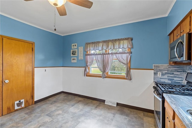 670 County Route 25th Rd Unit 25, Minetto, NY 13126 - kitchen with appliances with stainless steel finishes, decorative backsplash, a ceiling fan, brown cabinetry, and light countertops