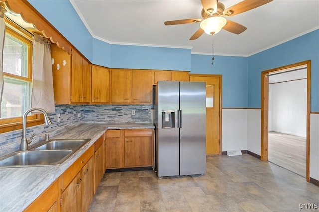 670 County Route 25th Rd Unit 25, Minetto, NY 13126 - kitchen featuring stainless steel fridge with ice dispenser, tasteful backsplash, a ceiling fan, brown cabinets, and crown molding