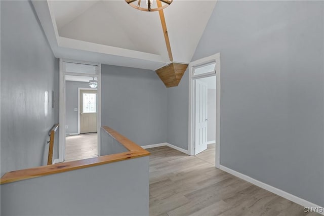 670 County Route 25th Rd Unit 25, Minetto, NY 13126 - hallway with wood finished floors and vaulted ceiling