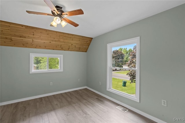 670 County Route 25th Rd Unit 25, Minetto, NY 13126 - unfurnished room with vaulted ceiling, plenty of natural light, a ceiling fan, and wood finished floors