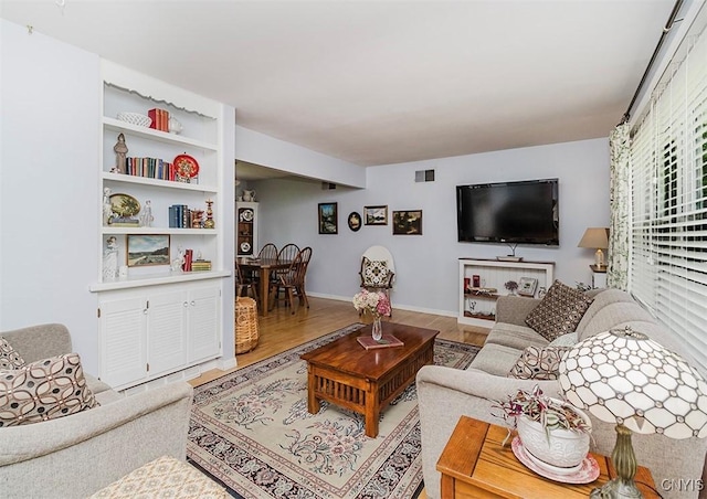 5458 Oxbow Rd, Cazenovia, NY 13035 - living area with wood finished floors and baseboards