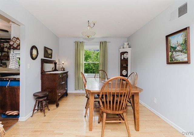 5458 Oxbow Rd, Cazenovia, NY 13035 - dining space with light wood-style flooring