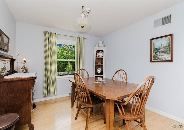 5458 Oxbow Rd, Cazenovia, NY 13035 - dining space featuring light wood finished floors and baseboards