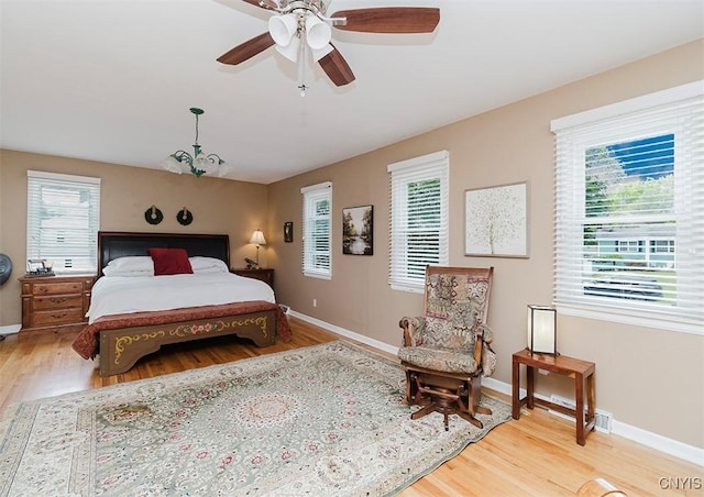 5458 Oxbow Rd, Cazenovia, NY 13035 - bedroom with wood finished floors and ceiling fan