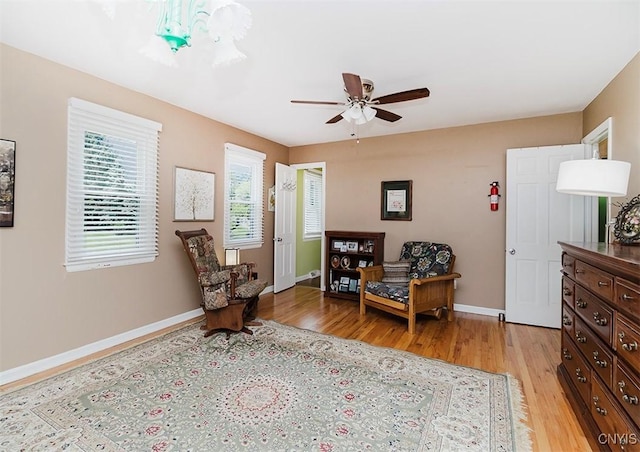 5458 Oxbow Rd, Cazenovia, NY 13035 - sitting room featuring light wood-style floors and a ceiling fan