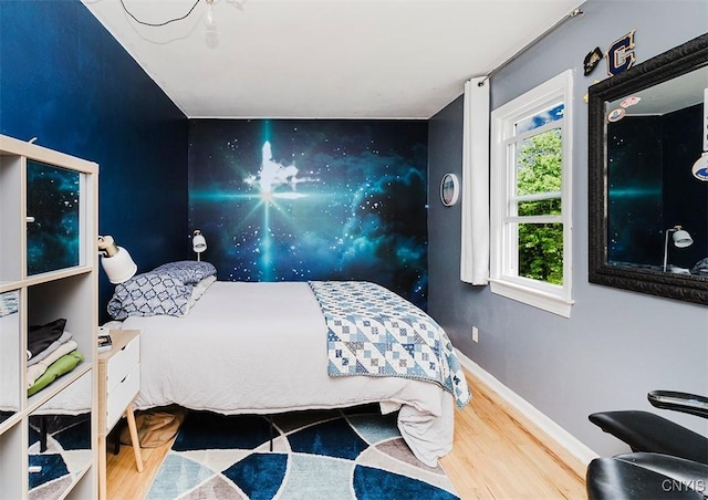 5458 Oxbow Rd, Cazenovia, NY 13035 - bedroom with wood finished floors and baseboards