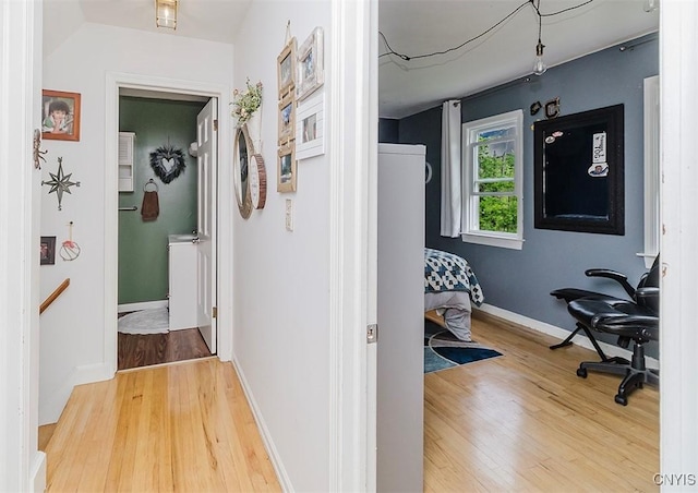 5458 Oxbow Rd, Cazenovia, NY 13035 - hallway with wood finished floors and baseboards