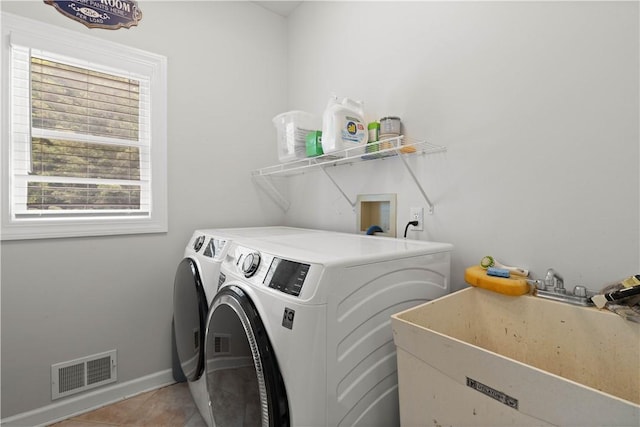 1335 Sagebrook Way, Webster, NY 14580 - laundry area featuring washer and dryer and light tile patterned floors