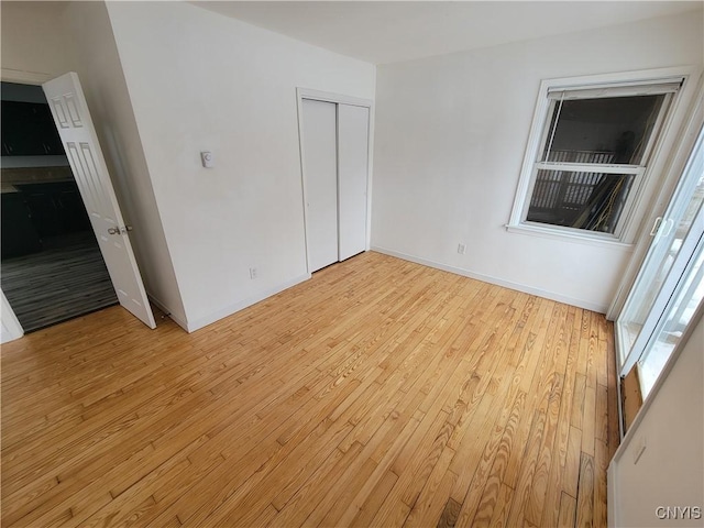 1665 State Route 31, Sullivan, NY 13037 - unfurnished bedroom with light wood-style floors and a closet