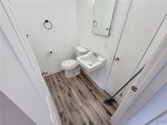1665 State Route 31, Sullivan, NY 13037 - half bathroom featuring a sink and wood finished floors