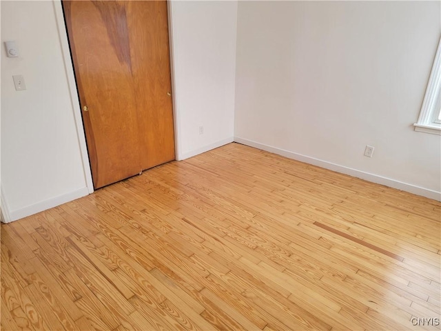 1665 State Route 31, Sullivan, NY 13037 - unfurnished bedroom with wood finished floors and a closet