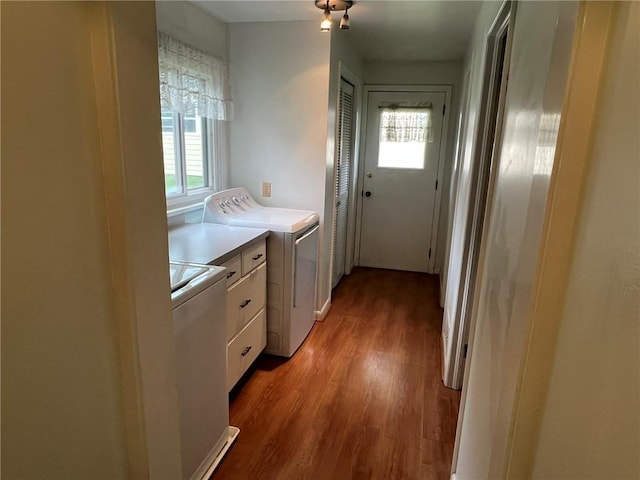 119 Platt St, Erwin, NY 14870 - laundry room featuring cabinet space, light wood finished floors, healthy amount of natural light, and independent washer and dryer