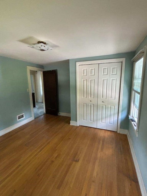 119 Platt St, Erwin, NY 14870 - unfurnished bedroom with wood finished floors and a closet