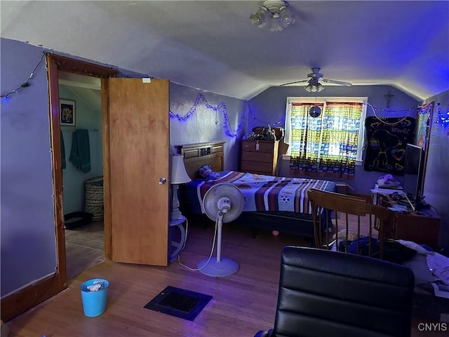 522 Craig St, Syracuse, NY 13208 - bedroom with lofted ceiling, wood finished floors, and a ceiling fan