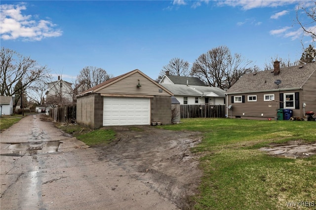 2125 Seneca Ave, Niagara Falls, NY 14305 - view of front of home with an outdoor structure and asphalt driveway