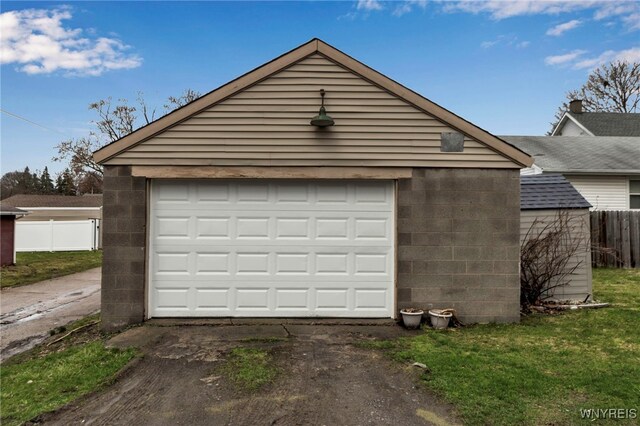 2125 Seneca Ave, Niagara Falls, NY 14305 - detached garage featuring asphalt driveway