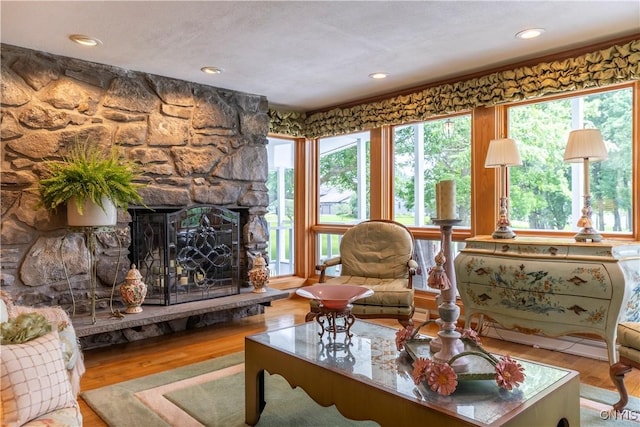 1664 S Ivy, Lysander, NY 13027 - living room with wood finished floors, a fireplace, and recessed lighting