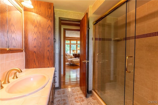 1664 S Ivy, Lysander, NY 13027 - bathroom with a shower stall, vanity, ensuite bath, and tile patterned flooring